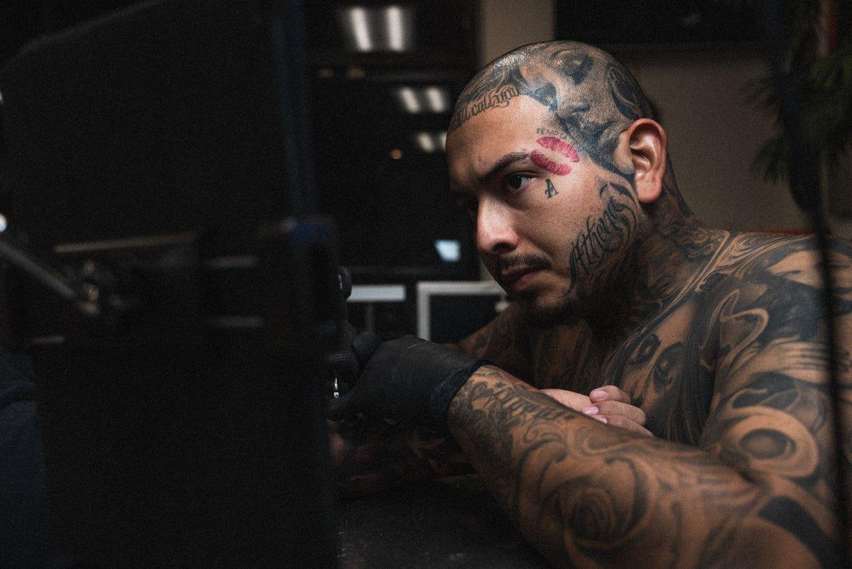 Mitchell Celaya tattooing